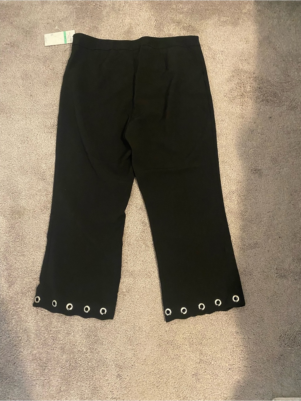 Classic Black Pants with Clean Seam Detailing. Silver grommets around bottom. - Picture 4 of 5